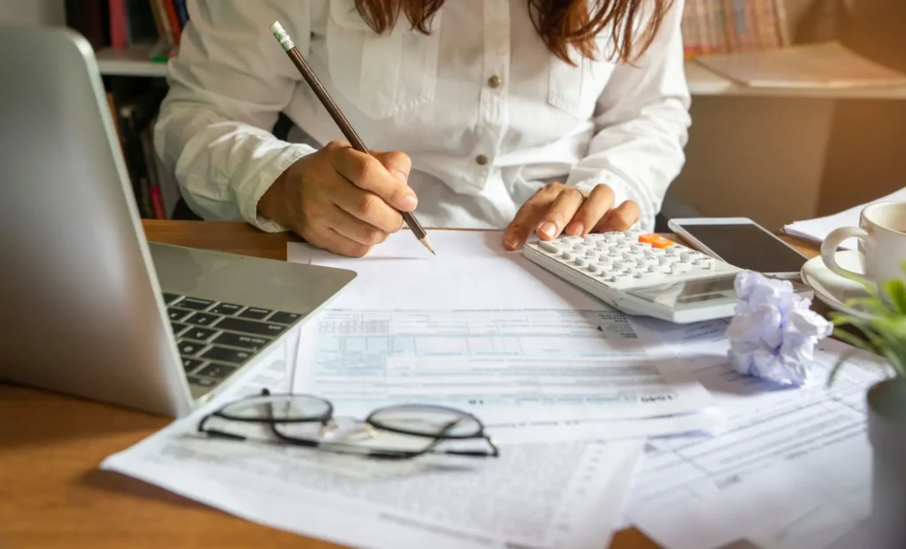 Woman making her Budget at a desk